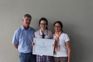 Kate is pictured with her proud parents, Terry and Maree Wilcox.